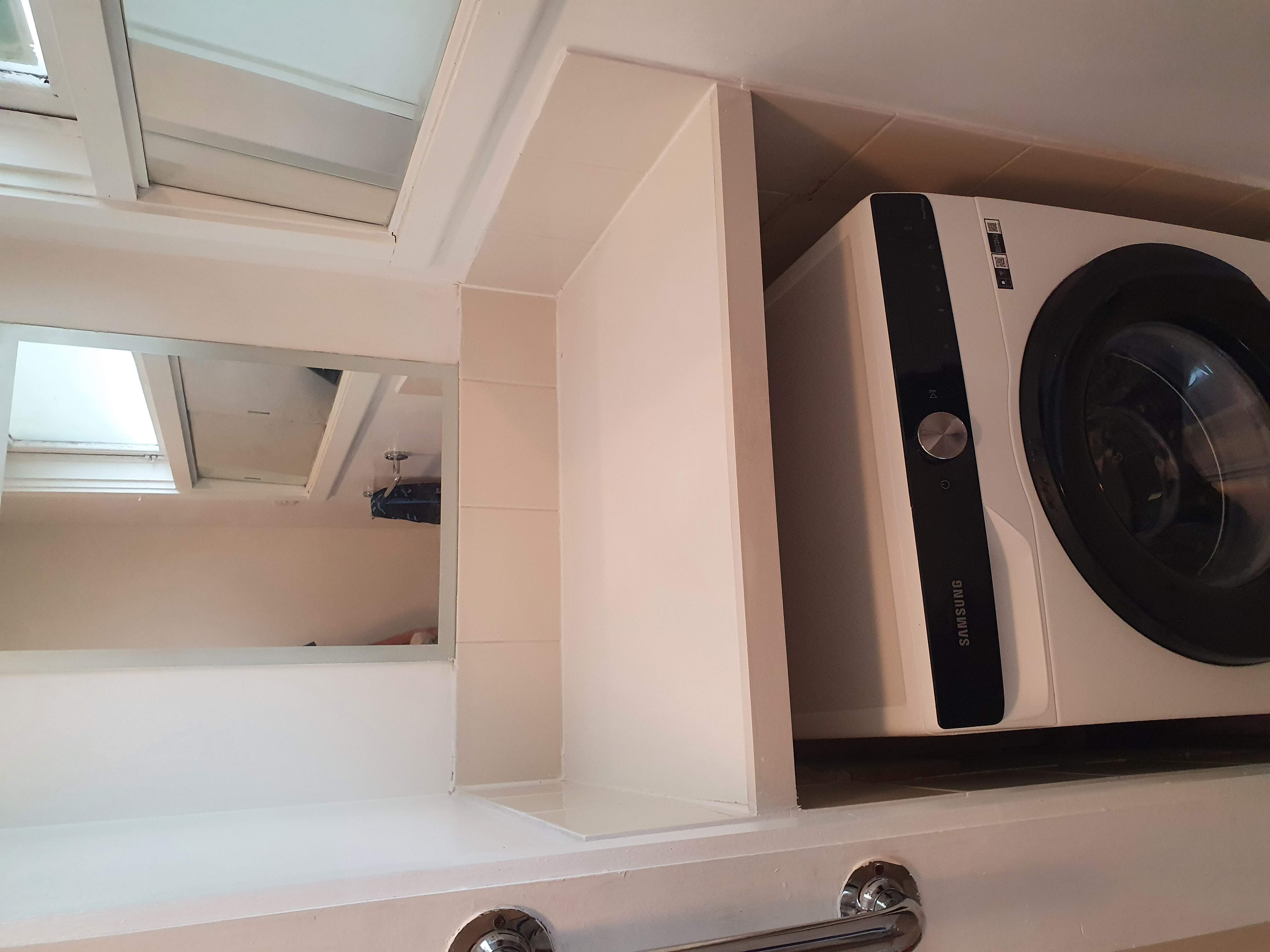 Laundry cupboard installation and cabinetry upgrade for a residential property